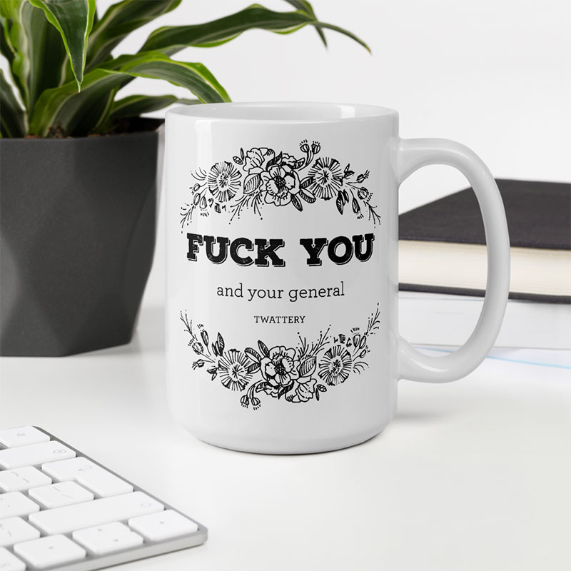 https://insultinggifts.com/wp-content/uploads/2020/10/Insulting-Gifts-MUG-15oz-fuck-you-and-your-general-twattery-01_mockup_Office-environment_Environment_15oz.jpg